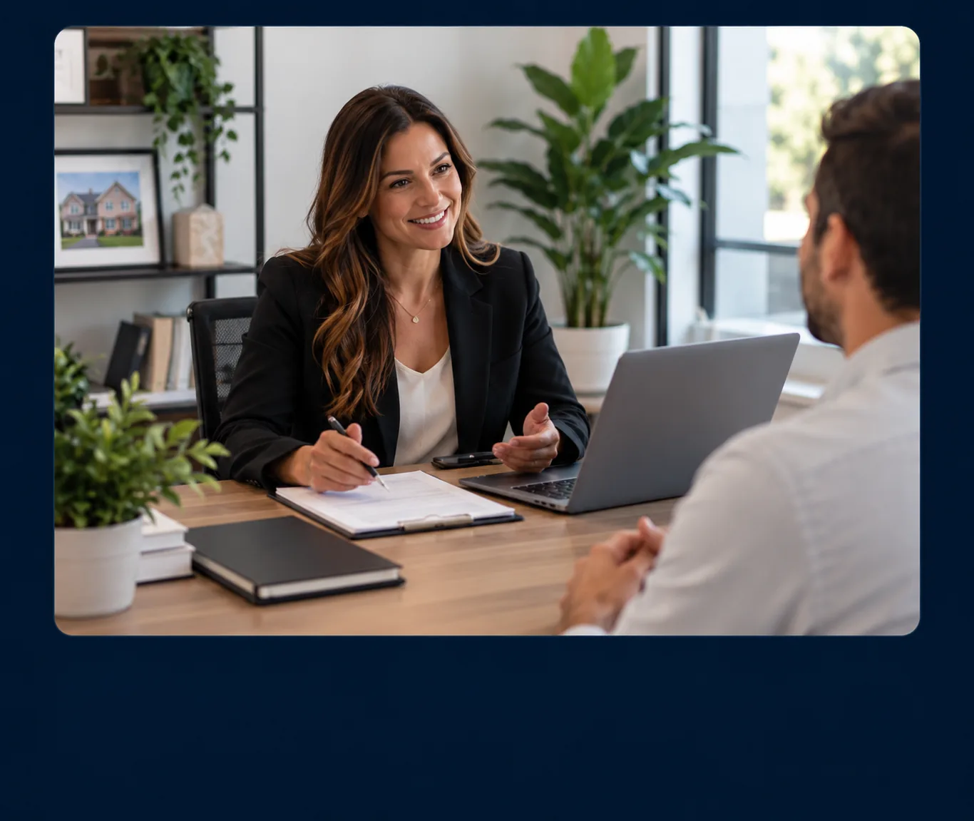 Mortgage professional recruiting a prospective loan officer in an office